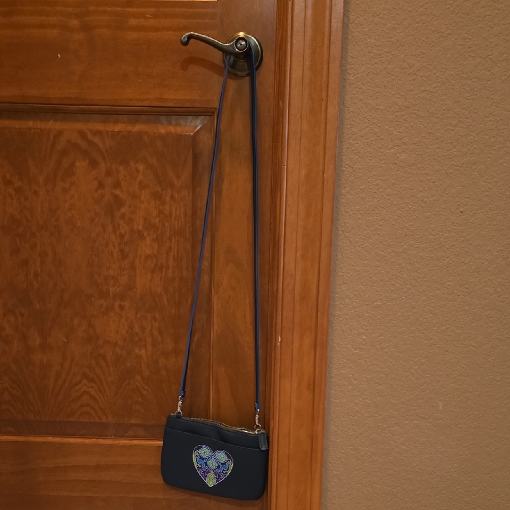 Elegant Navy Crossbody Bag with Heart Detail
